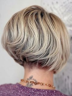 Stacked layered bob hairstyle with an undercut and blended layers Stacked Layered Bob, Stacked Inverted Bob, Short Stacked Bobs, Line Bob Haircut, Trendy Bob, Bob Haircut Ideas, Modern Bob, Undercut Styles, Stacked Bobs