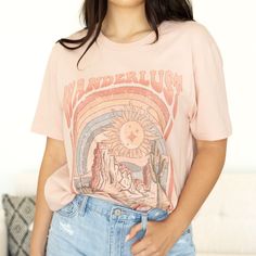 We are in love with this graphic tee. It offers a relaxed comfortable fit that we are sure you will fall in love with too! Model is 5'5" and is wearing a size Small/Medium Shoe Gifts, Loungewear Sets, One Piece Dress, Swim Bottoms, Skirted Swimwear, Short Sleeve Blouse, Sales Gifts, Long Tops, Fall In Love