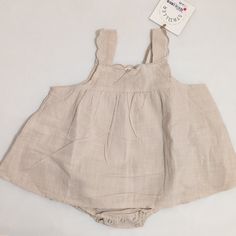 Darling One Piece Outfit, With Snap Internal Bloomer. Nwt Beige Bubble Romper For Summer Playtime, Beige Summer Bubble Romper For Playtime, Summer Beige Bubble Romper For Playtime, Cute Beige Cotton Bubble Romper, Sleeveless Beige Bubble Romper For Spring, Beige Sleeveless Bubble Romper For Spring, Spring Beige Bubble Romper With Ruffles, Cute Cream Bubble Romper For Spring, Cute Beige Bubble Romper For Spring