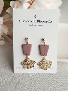 "These lightweight dangle earrings are the perfect complement to any spring party look. -DETAILS- Materials: Polymer Clay, Gold Plated Hardware Color: Blush Pink Length: About 1.75\" -SHIPPING- All orders are shipped in a small shipping box via USPS First-Class Mail. Shipping upgrades are available at checkout. Due to various settings on your device, the colors of these earrings may look slightly different from what you see on your screen, I try my best to make sure that the image you see is as Dainty Dangle Earrings, Spring Party, Color Blush, Party Look, Colorful Jewelry, Party Looks, Polymer Clay Jewelry, Clay Jewelry, Handcrafted Jewelry