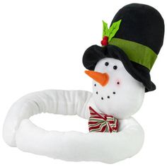 a snowman wearing a green hat and bow tie