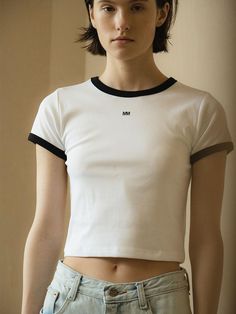 This is a trendy and unique t-shirt by MORCEAU PAR MORCEAU that is made out of high quality and sturdy material. With distinctive mood of the design and feminine look, you can style it for your trendy and casual daily outfit.- Soft and elastic touch of cotton blend fabric- Minimal logo print detail- Cropped and slim silhouette White Cotton Crew Neck Cropped T-shirt, Minimalist Crew Neck T-shirt, White Relaxed Fit Cropped T-shirt For Streetwear, White Cotton Graphic Tee Cropped T-shirt, White Cropped T-shirt With Letter Print, Crew Neck, White Cropped Crew Neck T-shirt With Letter Print, White Graphic Cotton Cropped T-shirt, White Sporty Cropped T-shirt For Spring, White Cotton Cropped T-shirt With Crew Neck