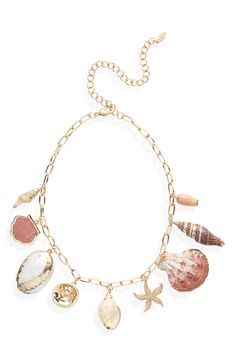 Beautiful shells and shimmering beach charms dangle from a chain-link necklace that brings a touch of seaworthy, vacation-ready style to your look. 14" length; 5" extender Lobster clasp closure 18k-gold plate/shell/glass/imitation pearl Imported Beach Jewelry With Dangling Charms, Ocean-inspired Jewelry With Lobster Clasp For Vacation, Ocean-inspired Jewelry For Vacation With Lobster Clasp, Ocean-inspired Starfish Charm Necklace For Vacation, Vacation Ocean-inspired Starfish Charm Necklace, Beach Shell Charms Jewelry, Shell Jewelry With Lobster Clasp For Vacation, Beach Shell Charm Necklaces With Lobster Clasp, Beach Charm Necklaces With Shell And Lobster Clasp