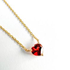 Heart shaped Pendant Necklace. Beautifully crafted, this Red Garnet pendant has beautiful heart shape and dainty style, this necklace that complements any ensemble with any style for everyday use. 14K Yellow Gold Garnet 6mm16" and 18" available Lobster clasp Heart-shaped Ruby Necklace For Gift, Elegant Red Heart Necklace With Birthstone, Elegant Red Heart Birthstone Necklace, Ruby Necklaces For Valentine's Day Gift, Ruby Birthstone Necklace For Valentine's Day, Valentine's Day Ruby Birthstone Necklace, Red Open Heart Necklace With Heart Beads, Red Gemstone Heart Pendant Necklace, Red Heart Charm Fine Jewelry