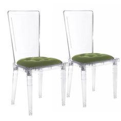 two clear chairs with green cushions on them