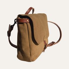 What you'll love about it: A messenger bag inspired by the days of old. The Tracker Messenger fits your laptop, notebooks, and is perfect for everyday use. The bag will wear with you and build character over time. Made with soft durable leather in coyote tan. How to style: A bag built for everyday use. This timeless piece pairs well with elevated casuals like denim and blazers. Details: -adjustable shoulder straps -unlined - 1 large outside pocket - 1 small inside pocket - laptop pocket - 3 pen Classic Waxed Canvas Laptop Bag For Everyday, Classic Everyday Waxed Canvas Laptop Bag, Classic Outdoor Satchel With Adjustable Strap, Rugged Everyday Satchel Shoulder Bag, Brown Waxed Canvas Laptop Bag With Adjustable Strap, Rugged Standard Backpack With Adjustable Strap, Rugged Crossbody Bag For Everyday Use, Classic Waxed Canvas Satchel For Everyday Use, Classic Waxed Canvas Satchel With Adjustable Strap