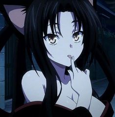 an anime character with long black hair and big eyes posing in front of the camera