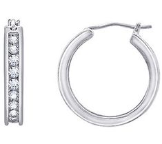 These bedazzled hoops look sweet with day-to-day styles or worn alongside your favorite sparkling studs. Channel Set, Ear Piercings, Jewelry Gifts, Cubic Zirconia, Silver Bracelet, Hoop Earrings, Sparkle, Sterling Silver, Silver