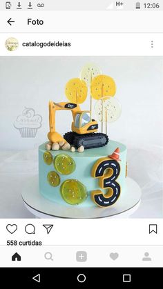 a cake that is on top of a table with an image of a bulldozer