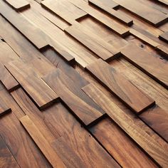 wood flooring that looks like it has been made from different types of planks