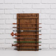 an arrow rack is mounted on the wall