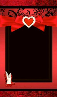 a red and black photo frame with a heart on the top, surrounded by bows