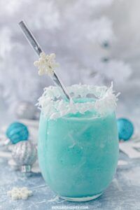 a frozen drink in a glass with a straw sticking out of it's top