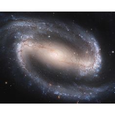 an image of a spiral galaxy with stars in the background