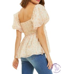 Indulge in romance with our floral puff-sleeved blouse. The square neck and smocked back add a flirty touch to this babydoll top. Perfect for date night or a day out with friends, it's the ideal combination of sweet and stylish. Material: 100% Polyester