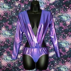 Not Accepting Offers! I Do Not Have A Job At The Moment! Price Is Firm! American Apparel Purple Blue Metallic Bodysuit New. Never Worn. #Americanapparel #Dollskill #Iheartraves #Purple #Metallic Red Pink Orange Yellow Green Cyan Blue Purple Lavender Amethyst Lilac Brown Black White Vampire Goth Gothic Emo Punk Alternative Rave Raves Edm Party Festival Dance Iridescent Holographic Hologram Shimmer Sparkle Glitter Neon Pastel Rainbow Dollskill Clubexx Currentmood Sugarthrillz Horoscopez Widow Amer Purple Long Sleeve Bodysuit For Spring, Spring Party Purple Bodysuit, Fitted Purple Bodysuit For Spring, Purple Bodysuit For Summer Nights, Purple Stretch Bodysuit For Night Out, Purple Summer Bodysuit For Night Out, Summer Purple Bodysuit For Night Out, White Vampire, Edm Party