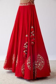 Red lehenga with floral motifs in dori and sequin embroidery. Paired with sleeveless blouse and embroidered sheer dupatta.
Component: 3
Pattern: Embroidered
Type Of Work: Sequins,Dori
Neckline: Plunge V Neck
Sleeve Type: Sleeveless
Fabric: Gajji Silk, Cotton Silk Satin And Silk Organza
Color: Red
Other Details: 
Organza dupatta
Sequin and resham work
Tassel detail
Occasion: Wedding - Aza Fashions Sheer Dupatta, Floral Lehenga, Resham Work, Red Lehenga, Sequin Embroidery, Organza Dupatta, Sequins Embroidery, Silk Organza, Floral Motifs