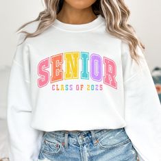 White Varsity T-shirt For School, White Varsity Tops For School, End Of School Year College Multicolor Top, White Custom Print Sublimation Design For College, White Letter Print Top For College Events, White Varsity Sweatshirt For School, School Spirit Sublimation Design In White, School Spirit White Sweatshirt With Custom Print, White School Spirit Sweatshirt With Custom Print