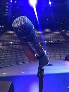 a microphone in front of an empty stage