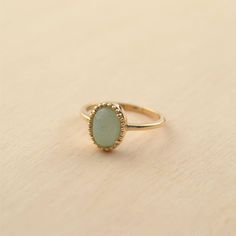 Lovely little ring adorned with a pretty green stone (aventurine). Both simple and elegant, it will gently dress your hands. Width: 1 cm. The jewel is delivered in pretty gift packaging. Material: gold plated and aventurine Hypoallergenic, this jewel is water resistant and does not darken! Ring Gold Stein, Green And Gold Jewelry, Gem Stone Rings, خواتم خطوبة, Aventurine Ring, Rock Rings, Handmade Silver Jewellery, Gold Rings Simple, The Jewel