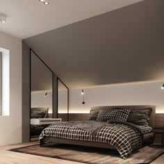 a bedroom with a bed and mirror in it