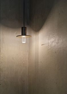 a light that is hanging from the side of a wall