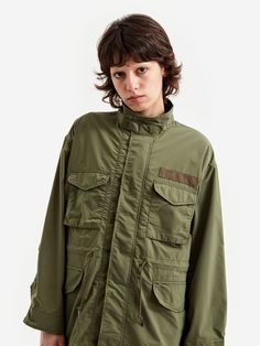 Taking cues from a traditional military jacket, this piece comes equipped with multi patch pockets, drawstring waist and buttoned cuffs. Constructed using Solotex for outstanding dyeability and a soft, light and slightly stretchy finish. 55% Polyester / 45% Composite Fiber (Polyester) Solotex Fabric Multi-Pocketed Drawstring Waist *Model is 5'8" and wears a size Small Utility Style Nylon Parka With Multiple Pockets, Utility Nylon Parka With Multiple Pockets, Utility Nylon Parka With Cargo Pockets, Nylon Utility Parka With Cargo Pockets, Fall Khaki Nylon Utility Jacket, Khaki Military Outerwear With Patch Pockets, Green Utility Jacket With Side Pockets, Olive Military Outerwear With Patch Pockets, Green Military Outerwear With Patch Pockets