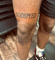 a man's legs with the word god speed written on them, in black ink