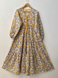 "Hand block print maxi, boho maxi, cotton dress, cotton maxi, 100%cotton, indian maxi, indian cotton dress, hippie dresses, vintage maxi, yellow dress, yellow maxi, Christmas gift for her, holiday dress, women's maxi, floral dress, hand print dress, long maxi, tier maxi, printed dress, summer dresses, beautiful printed dress, customized dresses    Feel beautiful and confident throughout your days wearing our block printed outfits, made with high quality soft and breathable cotton fabric.  The print on the dress is known as \"BLOCK PRINT\" which is centuries old technique of Indian textile carried out  by local artisans of Jaipur (INDIA) MEASUREMENTS (in inches): Size XXS-: Bust- 34″ | Shoulder- 13.5″ | Length- 51″ Size XS-: Bust- 36″ | Shoulder- 14″ | Length- 51″ Size S-: Bust- 38″ | Shoul Multicolor Cotton Maxi Dress With Floral Print, Multicolor Floral Print Cotton Maxi Dress, Printed Yellow Maxi Dress, Yellow Bohemian Printed Midi Dress, Long Cotton Bohemian Dress, White Anarkali Cotton Maxi Dress, Yellow Bohemian Boho Dress With Floral Print, Yellow Bohemian Dress With Floral Print, Bohemian Yellow Floral Dress For Beach