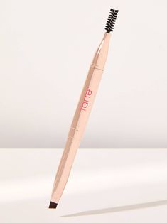 WHAT IT IS  Be the architect of your arches with this easy-to-use vegan & cruelty-free retractable eyebrow brush which features an angled brow brush on one end & a spoolie on the other. Bold Brows, Brow Brush, Creamy Concealer, Brow Pomade, Juicy Lips, Tarte Cosmetics, Tarte Makeup, Eyebrow Brush, The Architect