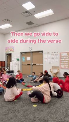 a group of children sitting on the floor in a room with a sign that says, then we go side to side during the verse