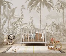 a baby's room with an animal themed wallpaper