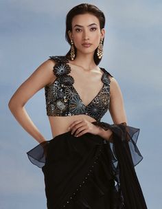 Indulge in celestial grace with blouse paired with a pre-stitched draped scallop edged sari. The galaxy blouse adds a touch of sophistication, while the pre-stitched sari with scallop edges creates... Drape Blouse Pattern, Sarees Black, Blouse Organza, Stitched Saree, Saree Wearing Styles, Saree And Blouse, Fancy Sarees Party Wear, Draping Fashion, Cute Casual Dresses