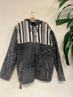 "Handcrafted : Each jacket is a unique creation by Nepali artisans, featuring vibrant patterns and intricate stitches. Unisex and Versatile: Suitable for everyone, perfect for both outdoor cold and indoor comfort. Eco-Friendly Comfort: Made from 100% cotton, offering breathability and coziness with added pockets for convenience. Additional Front Pocket included. Each purchase supports the skilled hands that bring these jackets to life, fostering sustainable practices and empowering communities in Nepal. Sizing Small(S) : Chest: 21\" | Length: 26\" | Shoulder: 18\" |  Sleeve Length: 22.5\"   | Arm Hole: 10\" Medium (M): Chest: 22\" | Length: 27\" | Shoulder: 18.5\" |  Sleeve Length: 23\" | Arm Hole: 10.5\" Large(L): Chest: 23\" | Length: 28\" | Shoulder: 19\" | Sleeve Length: 23.5\"   | Arm May 5, Cotton Hoodie, Nepal, Casual Style, Ideal Gift, Pullover Hoodie, Comfort Fit, Sleeve Length, Festival