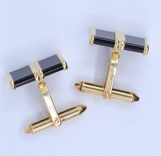 Handsome pair of perfect condition Dolan Bullock 14K yellow gold cufflinks with black onyx gemstones. Cufflinks measure 19mm long and 14mm in width. Cufflinks weigh 10 grams. Marks are 14K and db. Luxury Black Jewelry For Office, Luxury Black Office Jewelry, Onyx Cufflinks, 3 Carat Diamond, Chocolate Diamonds, Gold Cufflinks, Jacksonville Fl, Ring Photos, 14k White Gold Ring