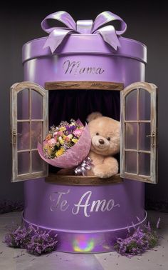 a teddy bear sitting in an open window with the word mama written on it and flowers