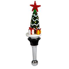 a wine bottle stopper with a christmas tree on it's top and presents underneath