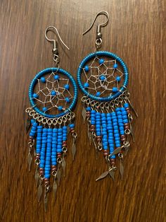 Dream Catcher Earrings  Pair of attractive Earrings Each earrings  measures about 8.05cm in length and 1.8cm in width. Dream Catcher Earrings, Dream Catcher, Jewelry Earrings Dangle, Etsy Earrings, Dangle Drop Earrings, Dangle Earrings, Jewelry Earrings, Gift Card, Etsy Accessories