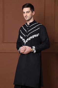 Black kurta with thread embroidered floral jaal and geometric patterns. Comes with a pathani. - Aza Fashions Designer Black Cotton Sherwani, Traditional Black Sherwani With Floral Embroidery, Black Embroidered Sherwani Straight Kurta, Black Cotton Sherwani For Festive Occasions, Festive Black Cotton Sherwani, Black Cotton Sherwani With Straight Kurta Shape, Black Cotton Sherwani Straight Kurta, Traditional Black Cotton Sherwani, Black Embroidered Cotton Sherwani