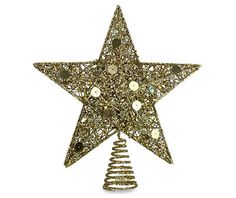 a gold christmas star ornament with spirals