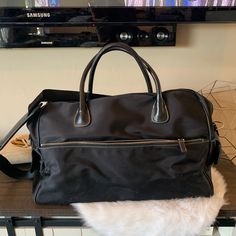 Maxx New York Black "On The Go Weekend Bag" Padded Shoulder Strap Large. Never Used. However A Few Very Minimal Marks On Exterior As Shown In Pic. As Always From A Smoke Free Home, Authentic, Clean, Fast Ship & Ready To Go! Teen Handbags, Free People Bags, Asics Running Shoes, Purple Bag, Travel Tote Bag, Trending Handbag, Travel Tote, Handbags Michael Kors, Duffel Bag