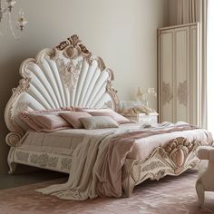 a large white bed sitting in a bedroom next to a window