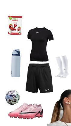 a woman in black shirt and shorts standing next to soccer ball, water bottle and other items