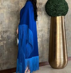 Tassel Dress For Eid Party, Party Dress With Tassels For Eid, Party Dresses With Tassels For Eid, Evening Kaftan With Tassels, Fringe Floor-length Maxi Dress, Blue Party Thobe Maxi Length, Blue Party Thobe In Maxi Length, Blue Maxi Length Party Thobe, Elegant Blue Party Thobe