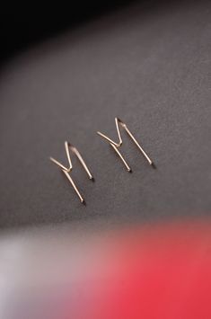 14k gold filled / 14k rose gold filled / sterling silver wire double piercing V threader earrings. Sold as a pair or a single piece. The distance between piercings is adjustable. Simply stretch out the V part if you need a bigger spacing. g o l d . f i l l Gold-fill is an actual layer of gold bonded with pressure to another metal, usually brass or copper. Gold-fill is not to be confused with gold plating as gold-fill has a much thicker layer of gold. Gold filled jewelry does not flake off or rub Minimalist 14k Gold Dangle Cartilage Earrings, Everyday Rose Gold Sterling Silver Ear Climbers, Minimalist 14k Gold Hypoallergenic Ear Climbers, Minimalist Hypoallergenic Yellow Gold Threader Earrings, Silver 14k Gold Threader Earrings With Ear Wire, Minimalist 14k Gold Ear Climbers As Gift, Minimalist Rose Gold Ear Climbers For Everyday, Minimalist 14k Gold Filled Wrap Earrings As Gift, Silver Minimalist Linear Earrings In 14k Gold