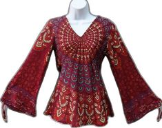 Hippie Style Long Sleeve Printed Tops, Hippie Long Sleeve Printed Tops, Hippie Patterned Tops For Fall, Bohemian Fitted Printed Shirt, Patterned V-neck Hippie Tops, Patterned Printed Hippie Top, Bohemian Stretch Cotton Blouse, Red Long Sleeve Hippie Blouse, Patterned Tops For Fall Festival