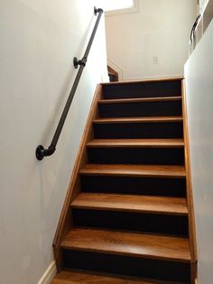 a set of stairs leading up to a window