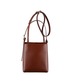 A.P.C. Women's bag. - Bag in smooth leather. - Leather inset. - Interior pocket. - Small drawstring bag attaches to the bottom. - Adjustable leather strap. One handle. - May be carried on shoulder or by hand. - Goldtone embossed A.P.C. logo on the small interior pouch. - Goldtone embossed 'A.P.C. Rue Madame Paris' logo. Classic Rectangular Bucket Bag With Adjustable Strap, Classic Square Bucket Bag For Travel, Classic Crossbody Bucket Bag For Business, Classic Business Bucket Bag With Detachable Strap, Classic Square Bucket Bag With Removable Pouch, Square Leather Bucket Bag With Detachable Strap, Leather Square Bucket Bag With Detachable Strap, Formal Rectangular Bucket Bag With Leather Handles, Square Leather Bucket Bag For Travel