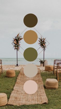 an outdoor ceremony setup on the beach with chairs and rugs in front of it