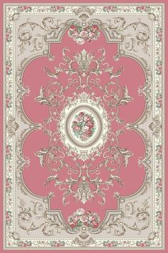 a pink and beige rug with an ornate design on the center, surrounded by flowers